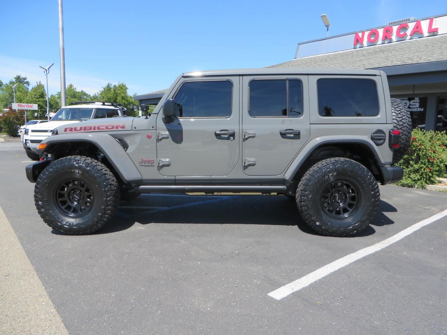 2021 Sting Grey /BLACK Jeep Wrangler Unlimited Rubicon (1C4JJXFM5MW) with an 3.0L V6 DOHC 24V TURBO DIESEL engine, 6A transmission, located at 2630 Grass Valley Highway, Auburn, CA, 95603, (530) 508-5100, 38.937893, -121.095482 - Diesel JL with Sky One power top featuring a Teraflex suspension system, Falcon adjustable shocks & steering stabilizer, Full Metal Cloak skid plate, 17" Method bead grip wheels, 37" Toyo RT Trail tires, Warn winch, Rigid Led lighting, Teraflex HD spare tire carrier, Teraflex Diff covers, Amp steps, - Photo#7